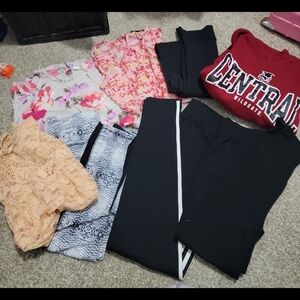 Bundle of women clothes. Variety sizes